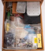 A collection of fly fishing accessories.