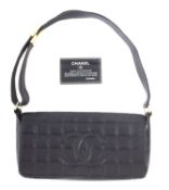 A Chanel leather flap bag.