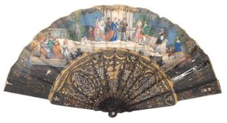 A 19th century Italian black laquer and paper hand painted fan.