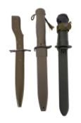 Three contemporary bayonets.