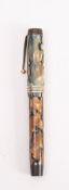 A Parker Duofold green marbled fountain pen, the cap with gilt clip and triple bands,
