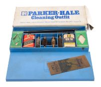 A Parker Hale 12 gauge shotgun cleaning kit. Comprising brushes and oil etc in original box.