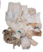 A collection of early 20th century linen and textiles. mainly tablewares.