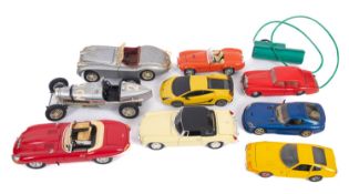 A collection of mainly 1:18 scale diecast cars.