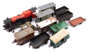 A collection of O gauge wagons.