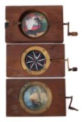A collection of three rack and pinion magic lantern slides.
