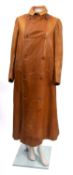 A brown leather driving coat.