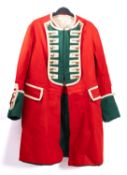 A 20th century reenactment British Infantry Red coat, with green facings and gilt buttons.