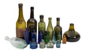 A collection of glass bottles. Comprising Exeter, Belfast and Canadian examples etc.