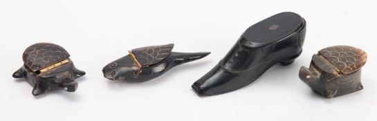 A Victorian papier mache snuff box in the form of a shoe, together with four later snuff boxes,