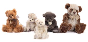 A collection of five Charlie Bear teddy bears.