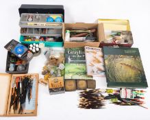 A collection of mixed fishing accessories.