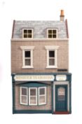 A scratch built Minster Tearooms Dolls House.