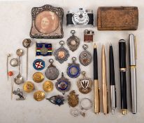 A group of mixed collectables.
