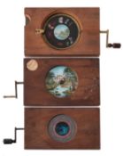 A collection of three rack and pinion magic lantern slides.