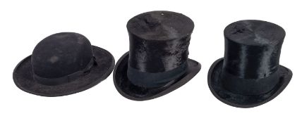 An early 20th century black silk top hat by Woodrow of London, size 53cm,