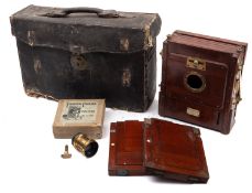 A mahogany and brass three quarter plate camera, maker Watson & Son, London,