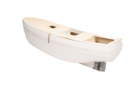 An incomplete scale model of a fishing trawler.