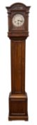 An Edwardian miniature oak longcase cloc