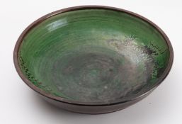 A studio pottery bowl, of shallow circul