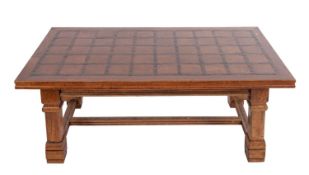 A walnut and sample wood coffee table, m