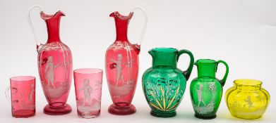 A group of green and red glassware in th