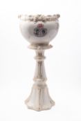 A Royal commemorative pottery Jardiniere and stand.