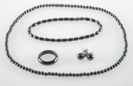 A set of hematite jewellery, including a