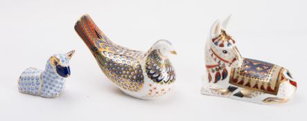 Seven Royal Crown Derby paperweights in