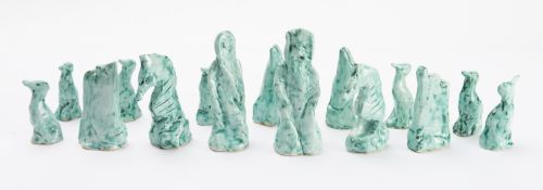 A handmade porcelain chess set. Glazed g