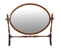 A mahogany and crossbanded oval dressing