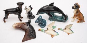 A group of ceramic animal figures. Inclu