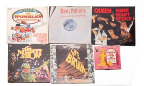 Two Monty Python vinyl records. Includin