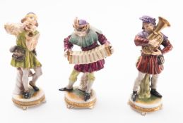 Three German porcelain figures of musici