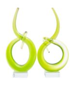 A pair of green 'Curl' sculptures, set