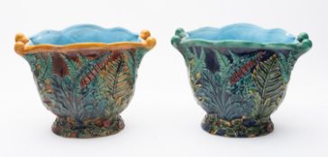A pair of English majolica jardiniere's, each embossed with wild flowers,
