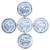 Five Chinese porcelain bowls of shallow circular form each painted in blue with a lakeside temple
