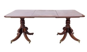 A George IV mahogany twin pedestal dining table,