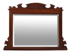 An Edwardian carved mahogany framed overmantel mirror,