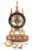 A late-Victorian English skeleton clock, having a single-fusee movement with anchor escapement,