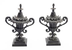 A pair of Regency patinated bronze pastille burners cast as twin handled urns,