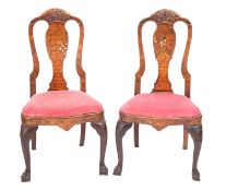 A pair of Dutch walnut, elm and marquetry side chairs,