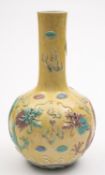 A Chinese porcelain vase of globular form with raised neck modelled in relief with a pair of