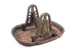 A Regency cast iron bootscrape,