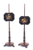 A pair of Regency rosewood and papier mache polescreens,
