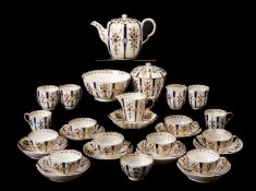 A Caughley porcelain tea service comprising a teapot and cover, milk jug, sucrier and cover,