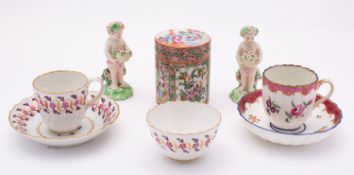 A mixed lot of ceramics comprising a pair of Chelsea-Derby putti holding baskets of flowers,