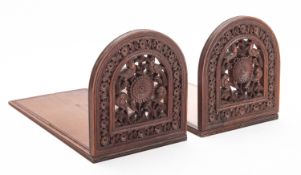 A pair of Anglo-Indian sandalwood bookends, late 19th century carved with birds,