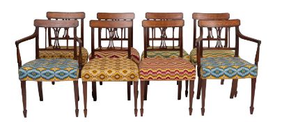 A set of eight Regency mahogany and line inlaid dining chairs,