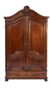 A pair of walnut Armoires,